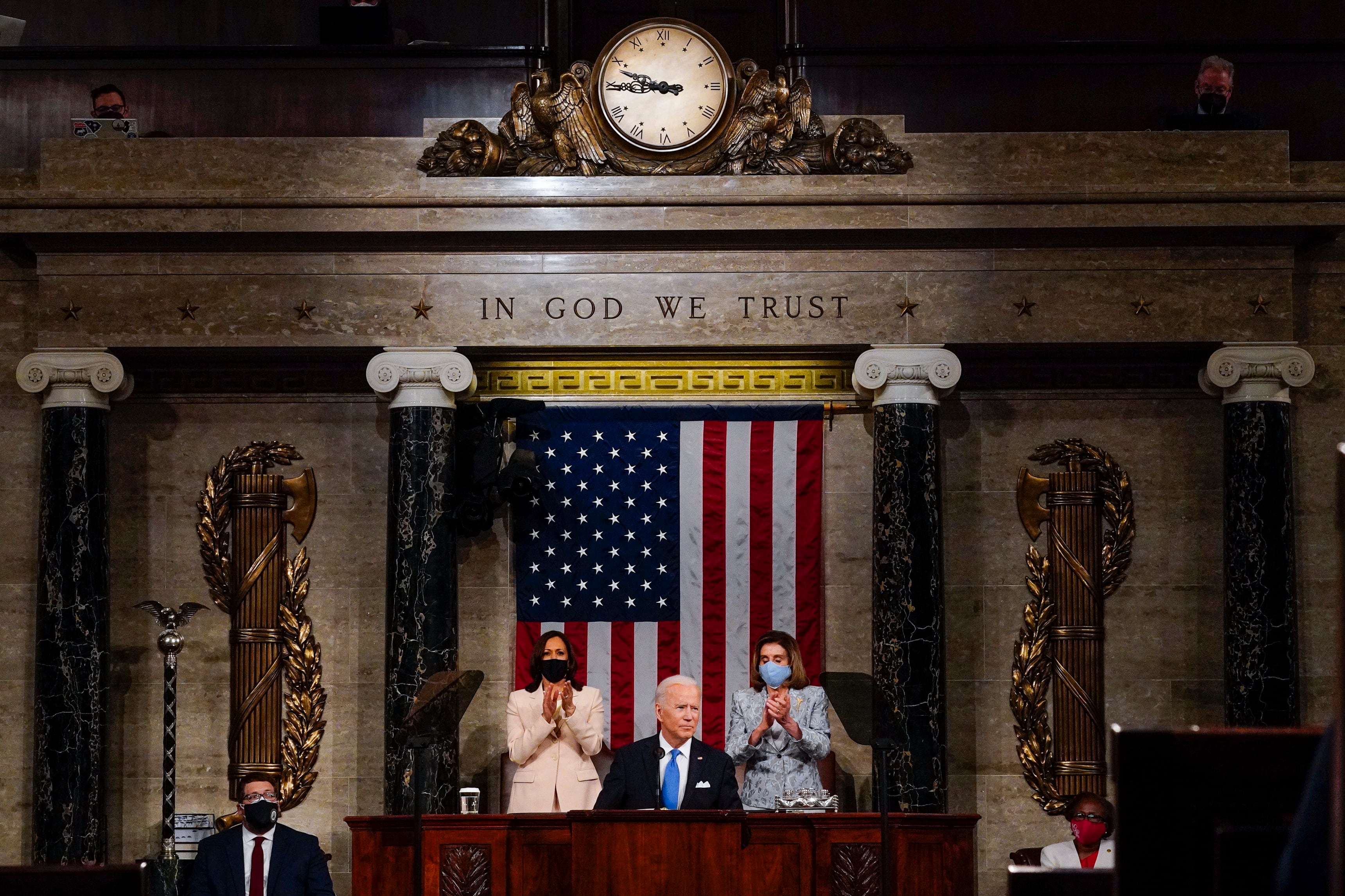 U.S. President Joe Biden addresses a joint session of Congress as Vice President Kamala Harris (L) and Speaker of the House U.S. Rep. Nancy Pelosi (D-CA) (R) look on in the House chamber of the U.S. Capitol April 28, 2021 in Washington, DC.